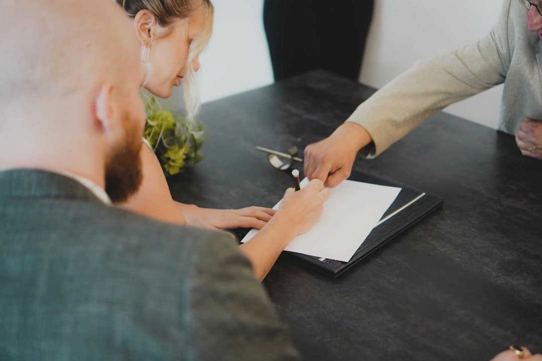 Woman signing a contract